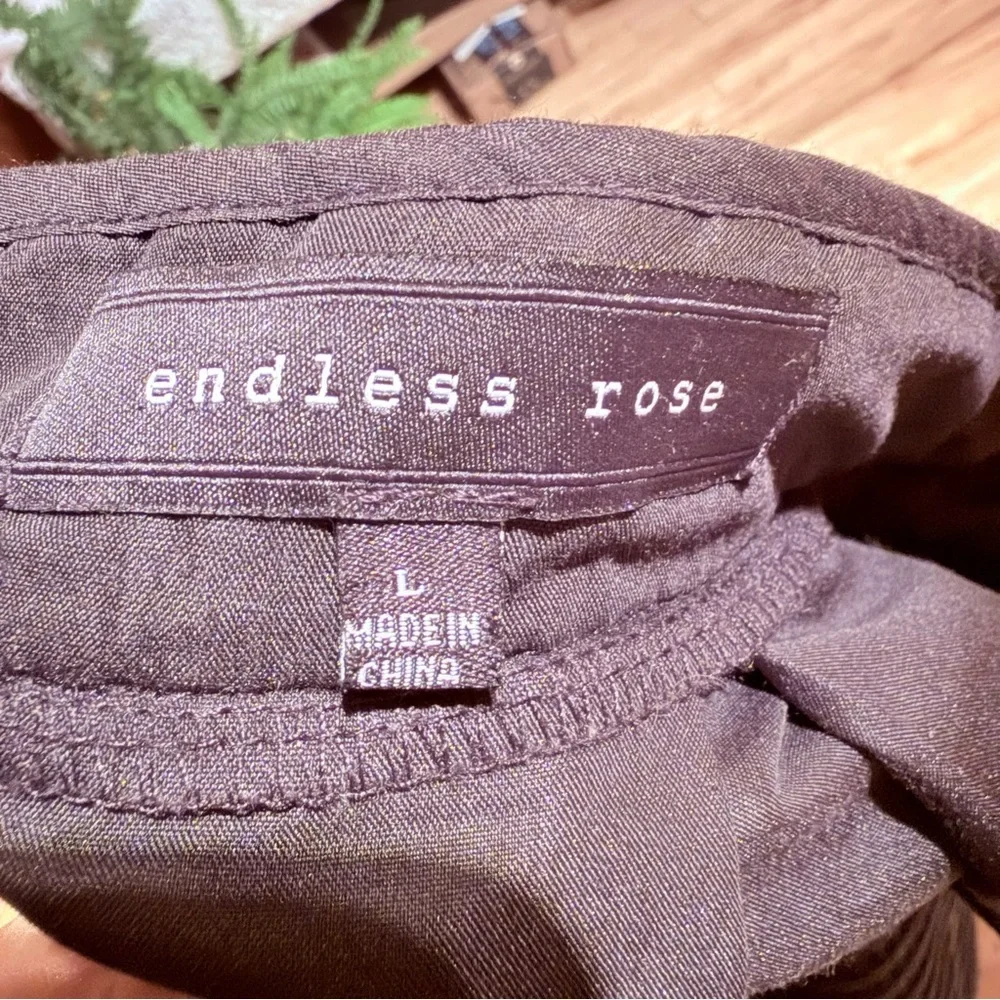Endless Rose pleated skirt in black.